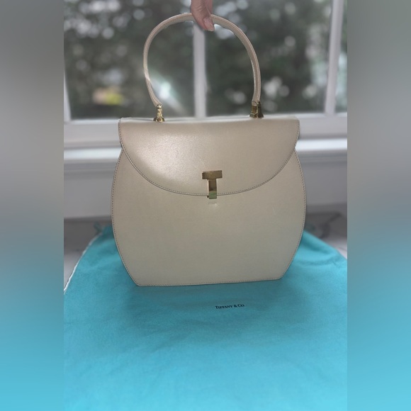 Tiffany & Co. Handbags - Tiffany & Co. T Lock Top Handle Ivory Leather purse